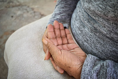 Close-up of person holding hands