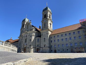 Historic building against clear blue sky