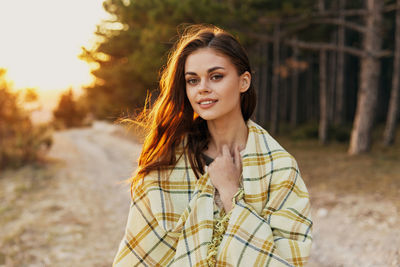 Portrait of smiling young woman