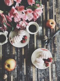 Directly above shot of various flowers in vase on table