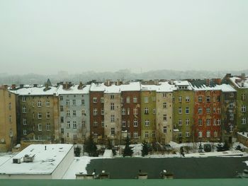 Cityscape against clear sky during winter