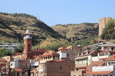 Buildings with mountains in background