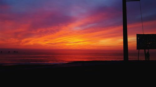 Scenic view of sea against sky at sunset