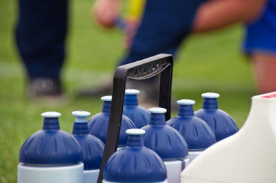 Close-up of blue bottles outdoors