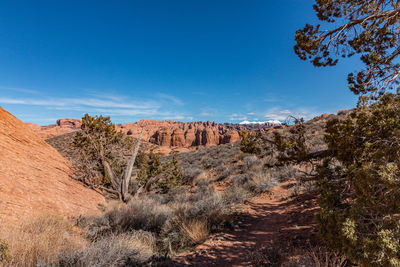 Rugged sandstone formations provide stunning scenery for hiking and scenic views