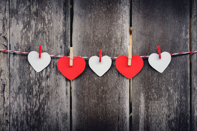 Close-up of heart shape hanging on wall
