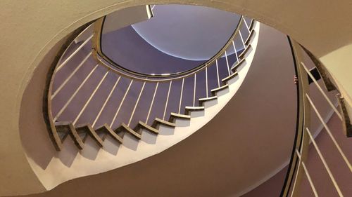 Low angle view of spiral staircase in building