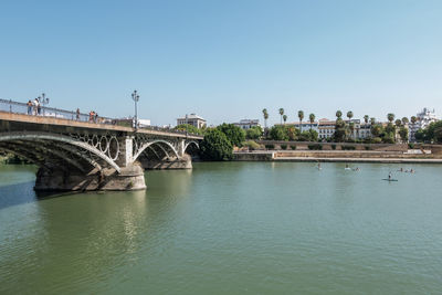 Bridge over river against sky