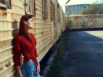 Rear view of woman walking on street