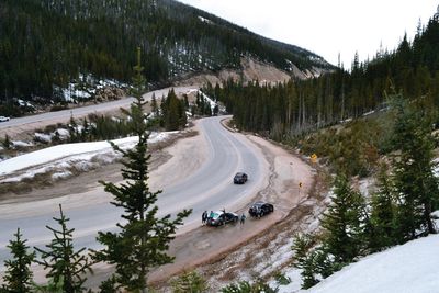 High angle view of cars on snow covered mountain