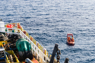 High angle view of ship sailing in sea