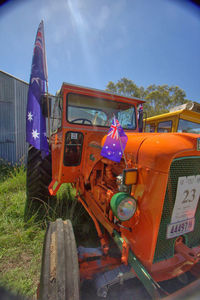 Panoramic shot of machinery on field against sky