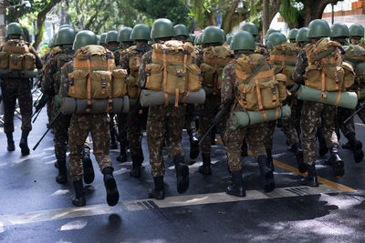 Army soldiers parade with equipment during a tribute to brazilian independence day 