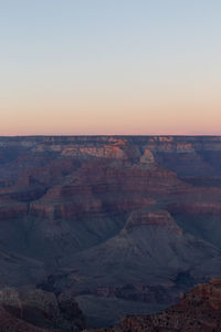 Aerial view of dramatic landscape during sunset