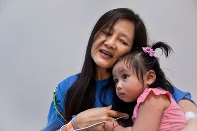 Portrait of mother and daughter