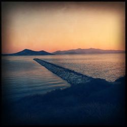 Scenic view of sea at sunset