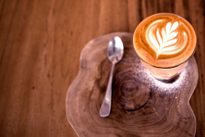 Close-up of cappuccino on table