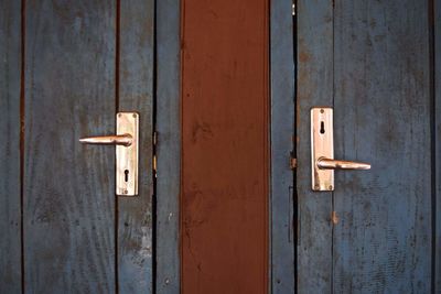 Close-up of closed wooden doors