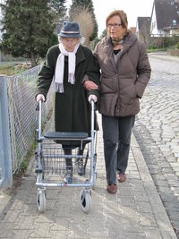 Full length portrait of a smiling young couple