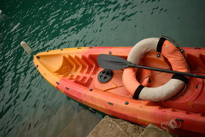 High angle view of kayak moored on shore