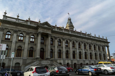 Low angle view of historic building against sky in city