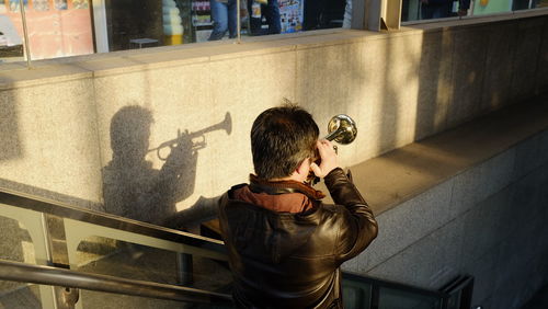 Woman photographing through camera