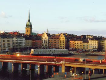 View of buildings in city at dusk