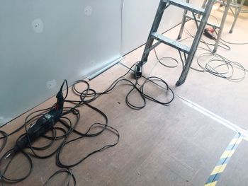 High angle view of bicycles on hardwood floor