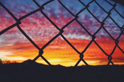 Chainlink fence seen through chainlink fence