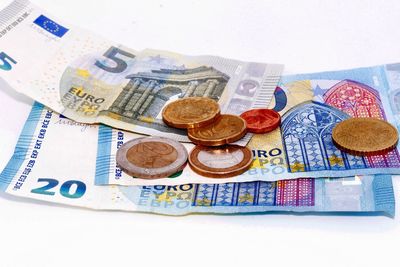 High angle view of coins