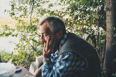 Portrait of man looking at camera