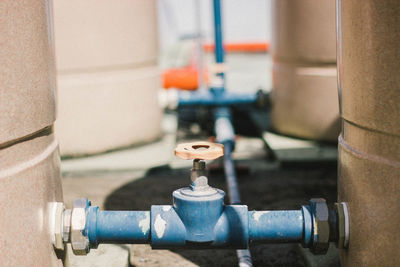 Close-up of pipes against wall