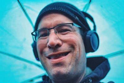 Close-up portrait of a smiling young man