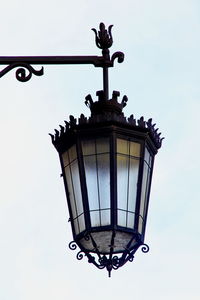 Low angle view of street light against sky