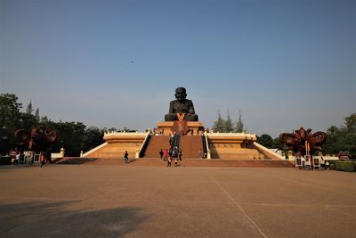 Group of people in front of historical building