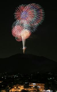 Firework display at night