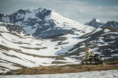 Scenic view of snowcapped mountains against sky