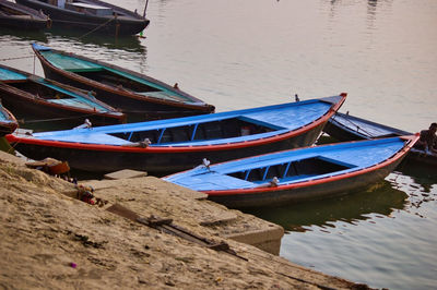 High angle view of boats moored at beach