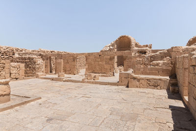 Ruins of temple against clear sky