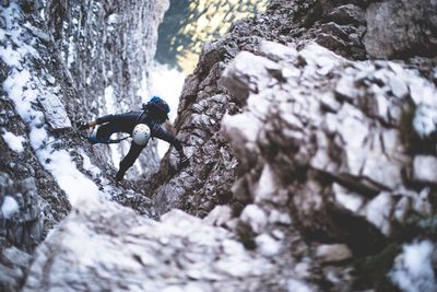 Person standing on rock formation