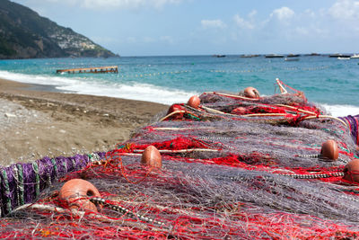 Close-up of fishing net on beach