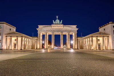 The brandenburg gate in berlin at night