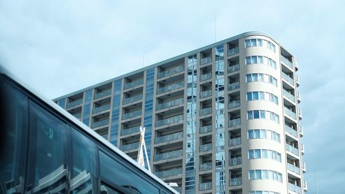 Low angle view of modern building against sky