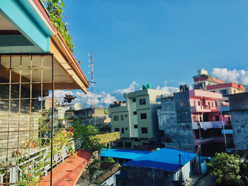 Buildings against blue sky