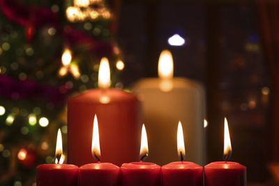 Close-up of burning candles during christmas