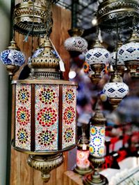 Close-up of lanterns hanging for sale in market