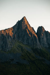 Scenic view of sun-kissed mountain in the morning. ideal for nature, landscapes, travel projects. 