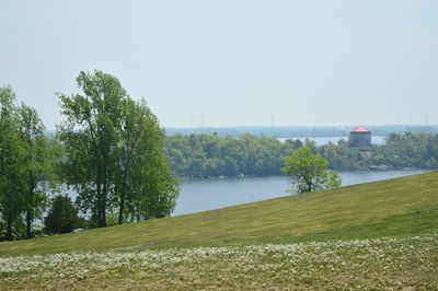 Scenic view of calm lake against clear sky