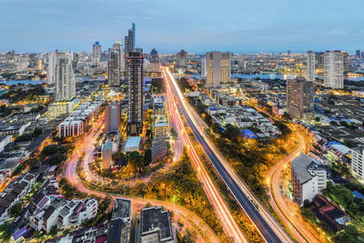 High angle view of light trails on road at night