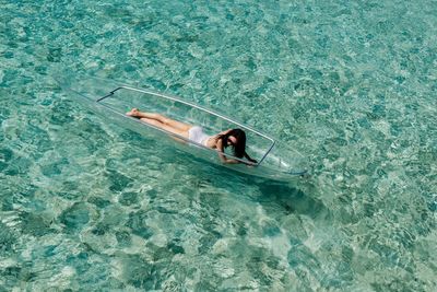 High angle view of woman in swimming pool